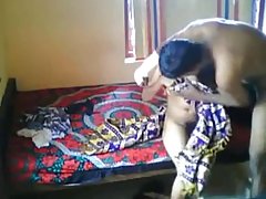 Indian woman was satisfying her husband's friend not knowing about a hidden camera in her bedroom