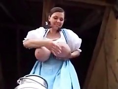Busty German lady is often playing with her huge milk jugs, because it feels good
