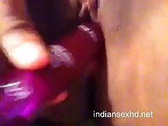 Horny girl is using a sex toy to satisfy her sexual needs, while she is home alone