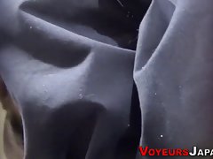 Asian teen in school uniform is masturbating like crazy, in front of a hidden camera